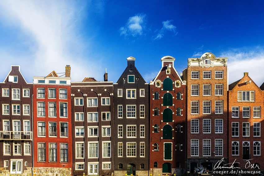 Historic Buildings At Damrak Amsterdam Netherlands